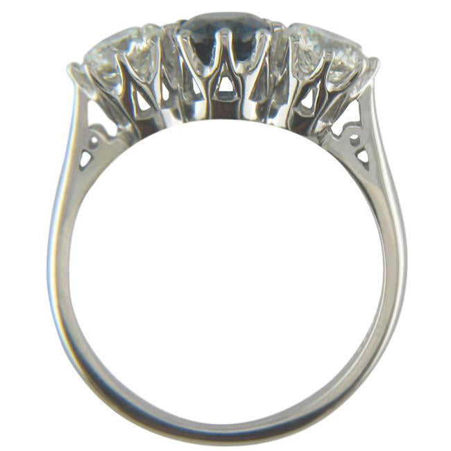 Sapphire ring in platinum with 1 carat diamonds.