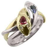 Gold and platinum snake ring with ruby and sapphire head