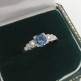 Aquamarine engagement ring with diamond band