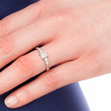 Platinum princess cut diamond ring on hand