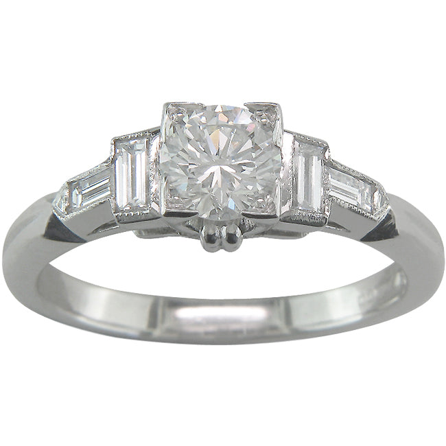 Diamond ring with baguette shoulders in vintage Art Deco design