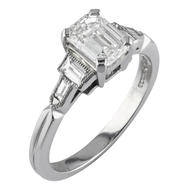 Art Deco emerald cut engagement ring with baguette side stones