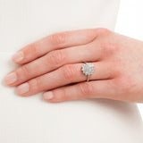 Vintage style diamond cluster ring on hand