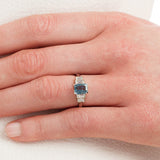 Large aquamarine ring on hand