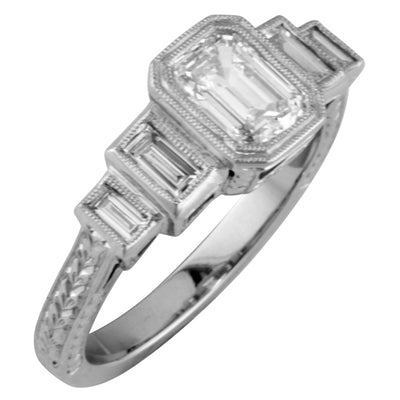Custom made emerald cut diamond ring