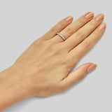Patterned diamond wedding ring in platinum