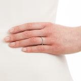 Wishbone wedding ring with diamonds in 18 carat white gold on hand