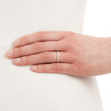 Nine stone diamond wedding ring on hand