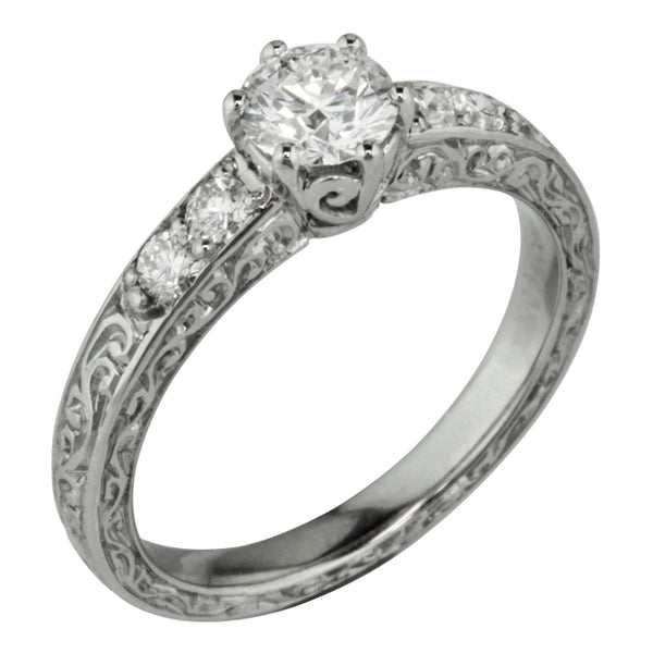 Unique hand engraved diamond engagement ring made in Britain