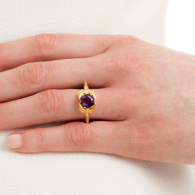 Amethyst engagement ring on hand