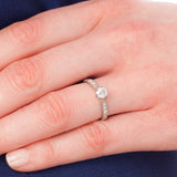 Engraved diamond ring on hand