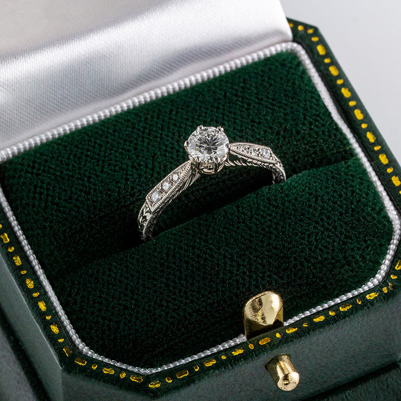 Engraved patterned vintage engagement ring in platinum