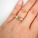 Yellow sapphire and baguette diamond ring