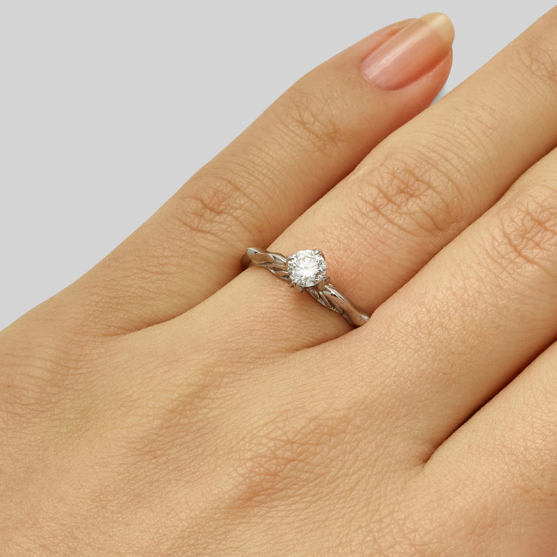 Edwardian round diamond engagement ring in floral design