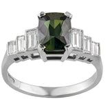 Vintage green sapphire ring with baguette diamonds