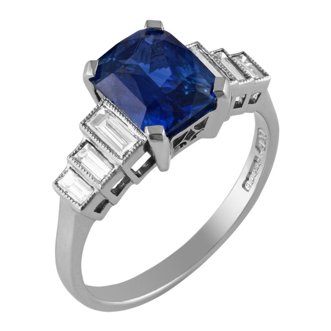 Emerald cut blue sapphire and diamond engagement ring