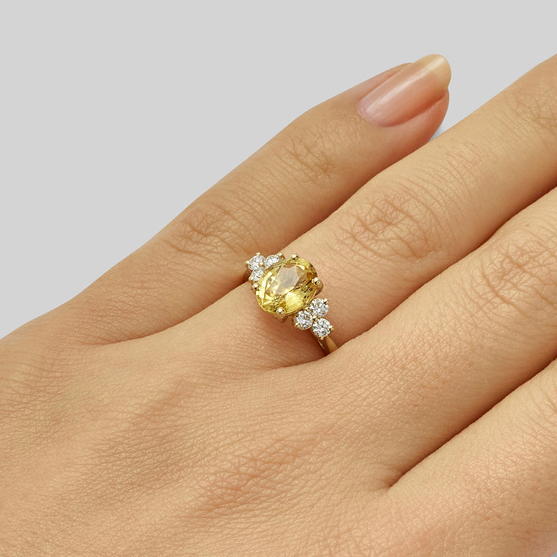 Vintage yellow sapphire ring with diamonds in yellow gold