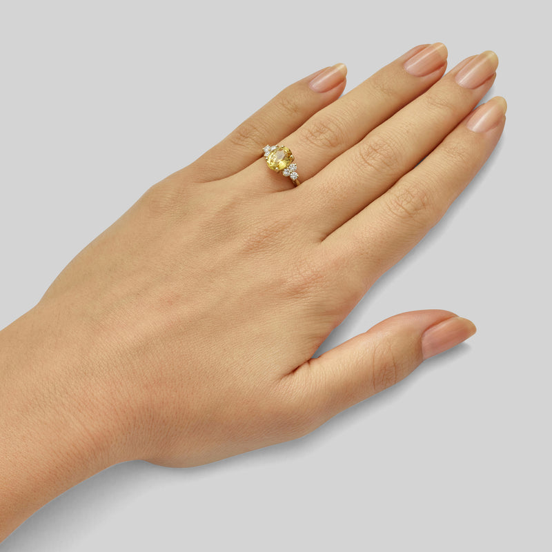 Yellow sapphire gold ring with diamonds