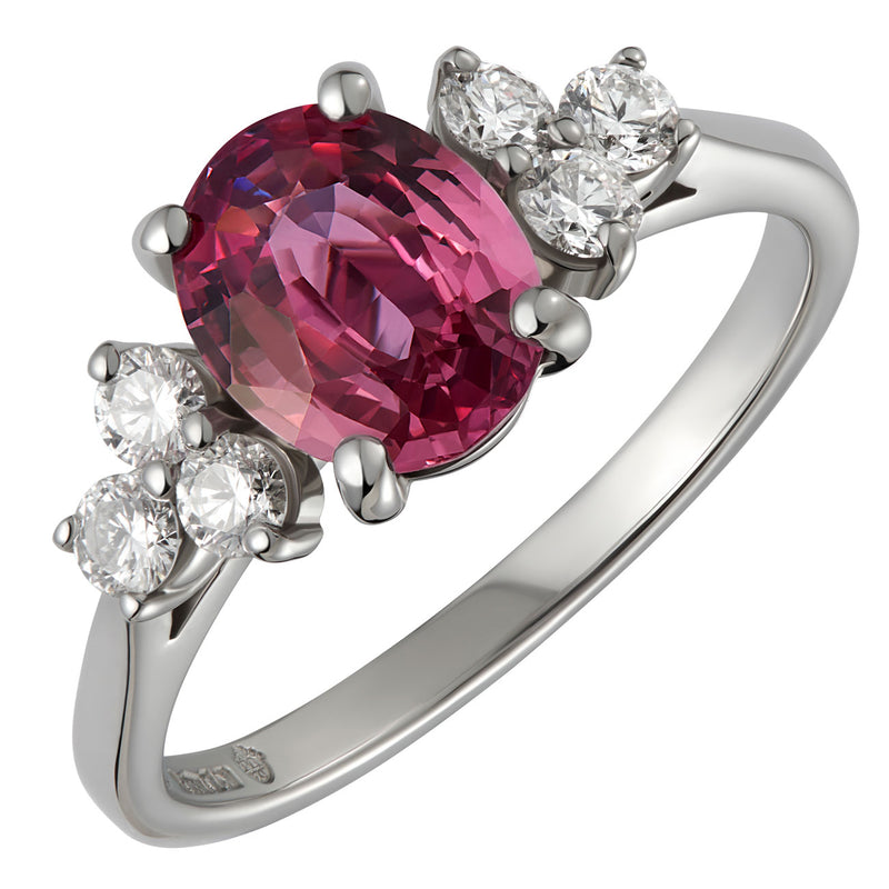 Oval pink sapphire diamond ring in platinum