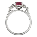 Oval pink sapphire and diamond platinum engagement ring
