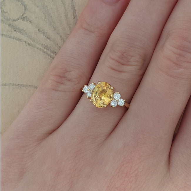 Yellow sapphire and diamond ring in 18ct yellow gold