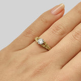 Vintage flower engagement ring with diamond centre