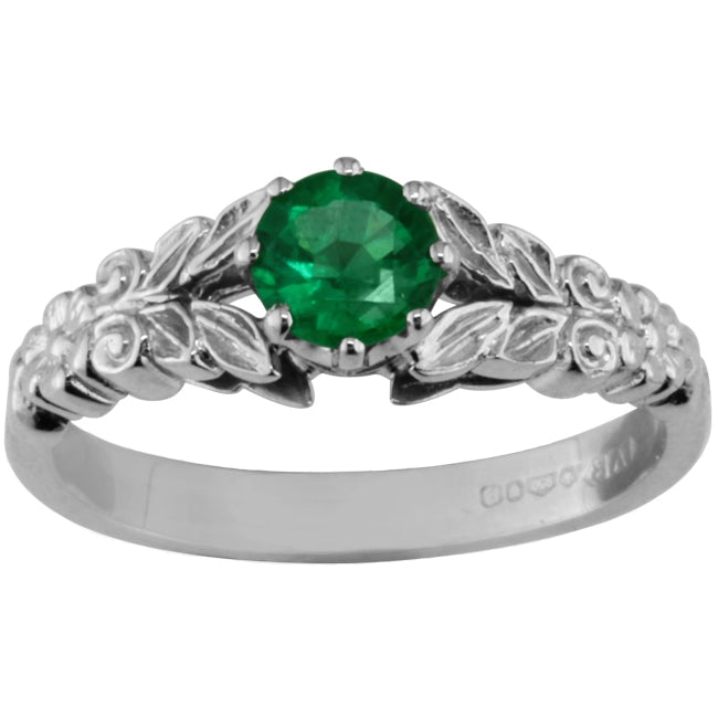 Vintage style emerald ring in platinum