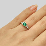 Vintage emerald engagement ring in floral design