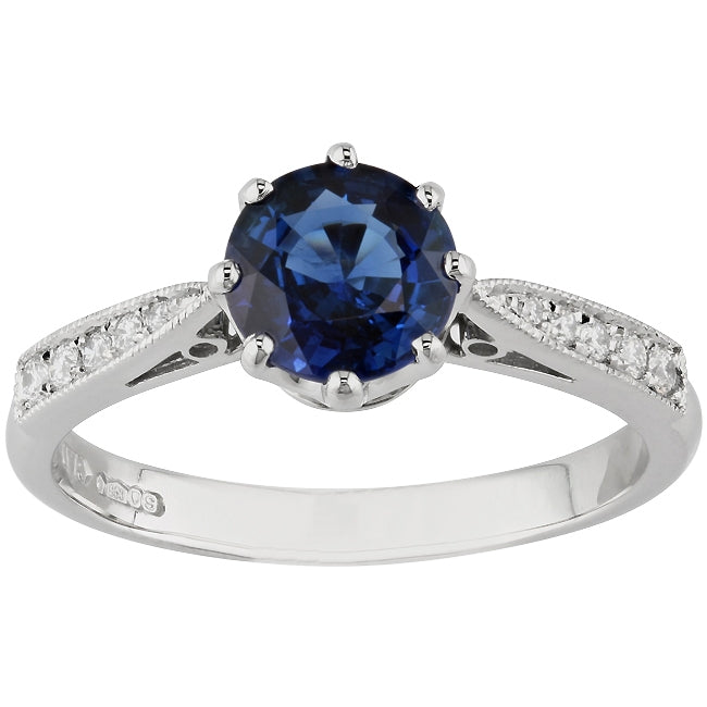 Sapphire engagement ring with diamond platinum band