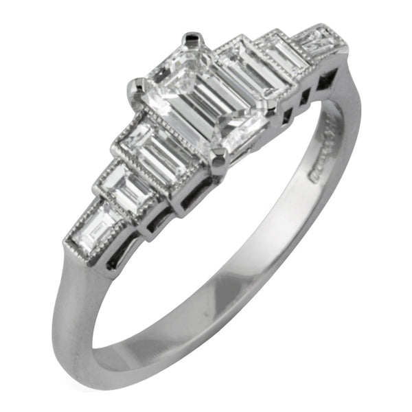 Emerald cut diamond ring with baguette side stones.