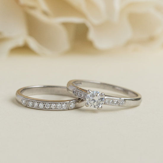 White gold bridal set with heart motif showing engagement and wedding ring