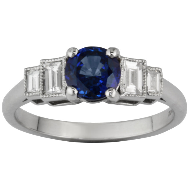 Sapphire engagement ring with baguette cut diamond side stones