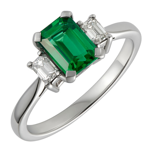 Emerald-cut emerald and diamond three stone ring