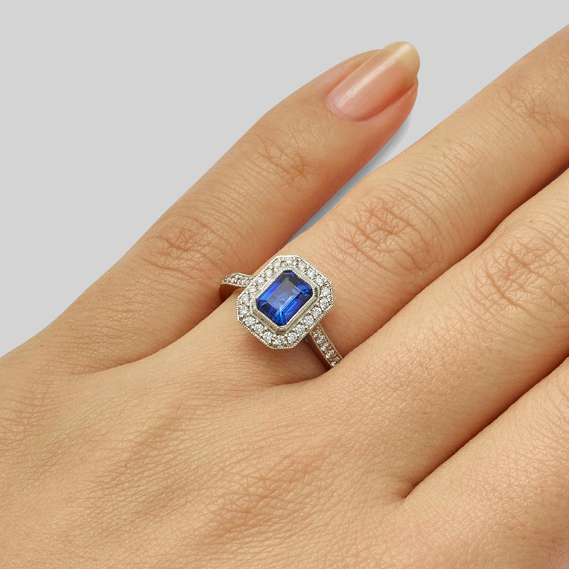 Blue sapphire and diamond cluster ring