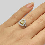 Emerald cut yellow sapphire engagement ring