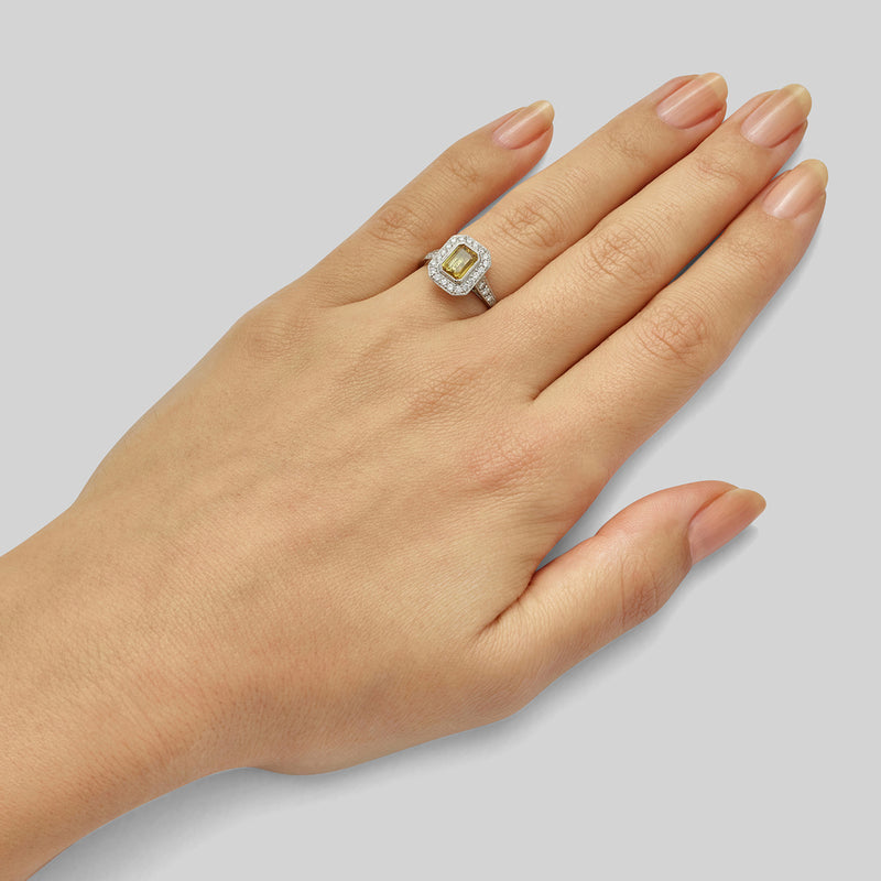 Yellow sapphire halo engagement ring
