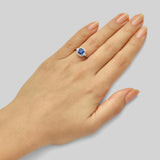 Cushion cut sapphire ring with baguette diamonds
