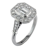 Emerald cut cluster halo engagement ring in platinum