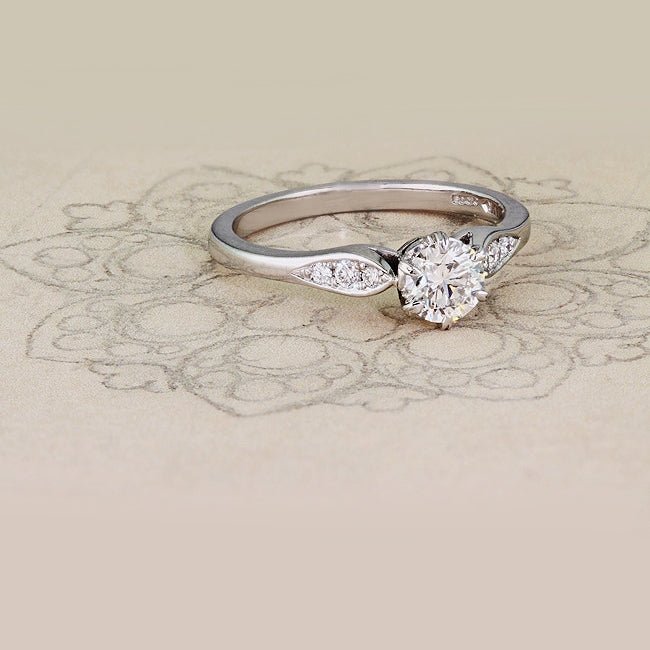 Edwardian platinum engagement ring on paper