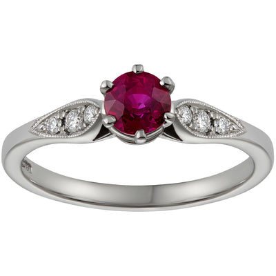 Round ruby engagement ring with diamonds in platinum