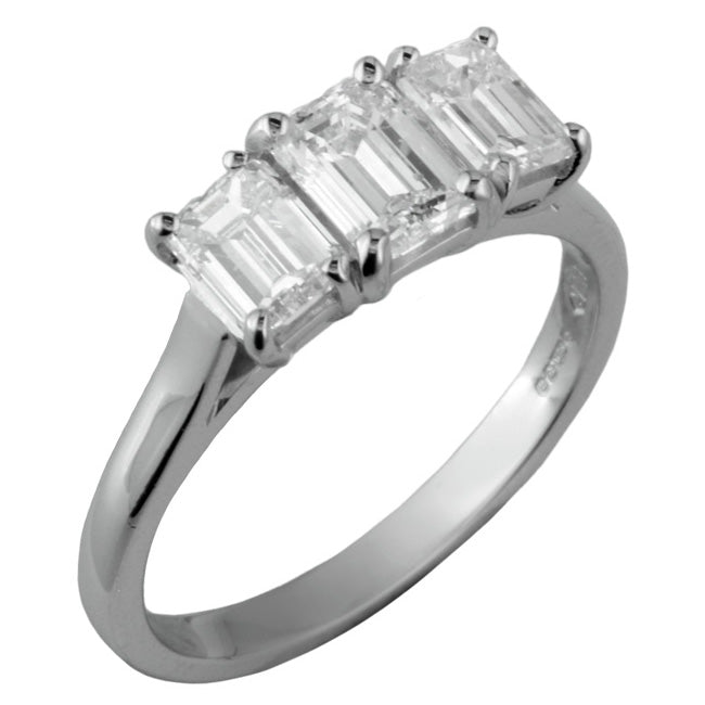 Bespoke emerald cut diamond three stone ring in the UK.
