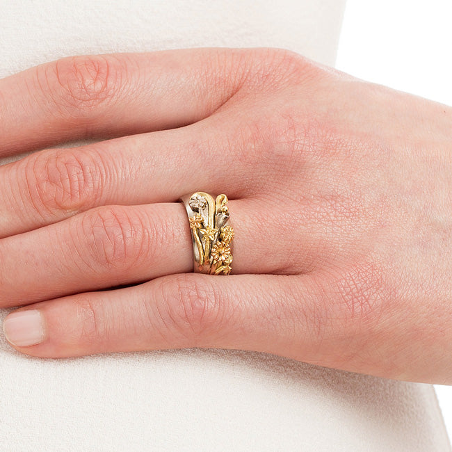 Vintage design gold floral ring on hand