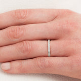 Vintage brilliant cut diamond platinum wedding ring worn by model