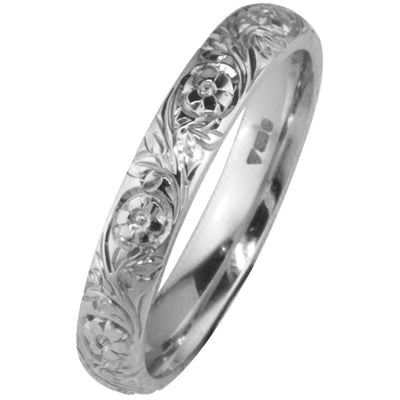 Floral engraved wedding ring with camellia japonica pattern in white gold