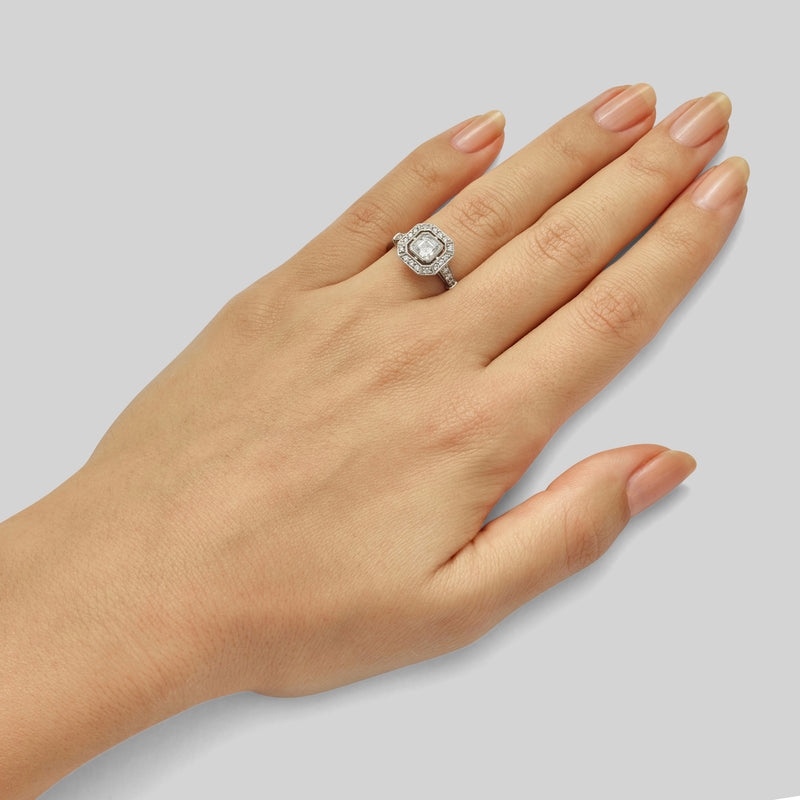 Asscher halo engagement ring in platinum