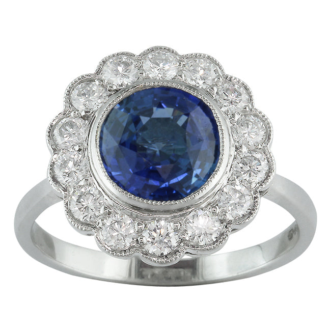 Sapphire and diamond cluster ring made in UK.