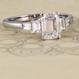 Emerald cut diamond ring with trapezoids and baguettes