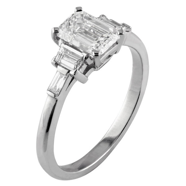 Emerald cut diamond ring with trapeze and baguette cut side stones