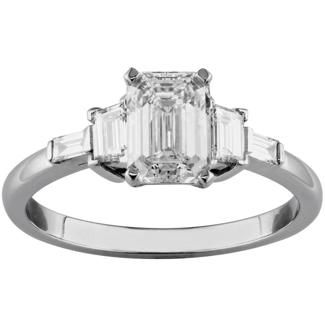 Emerald cut engagement ring with trapezoid side stones