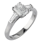 Emerald cut engagement ring with tapered baguettes